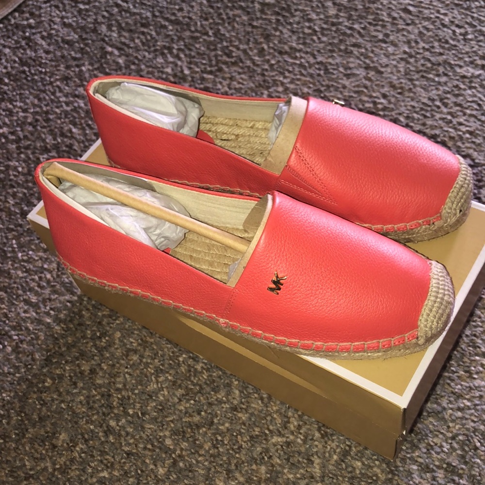 Michael Kors slip on shoes. 6